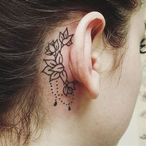 earlobe tattoos for females|tattoos behind ear female.